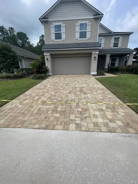 Restored paver patio after sealing by The Stream Team